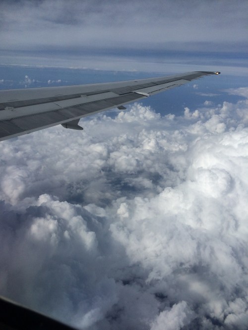 Fluffy cloud view from my Airplane window as I travel to Washington, DC.